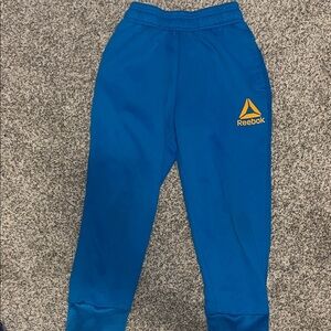 Reebok Kids Royal Blue Joggers with Orange Logo